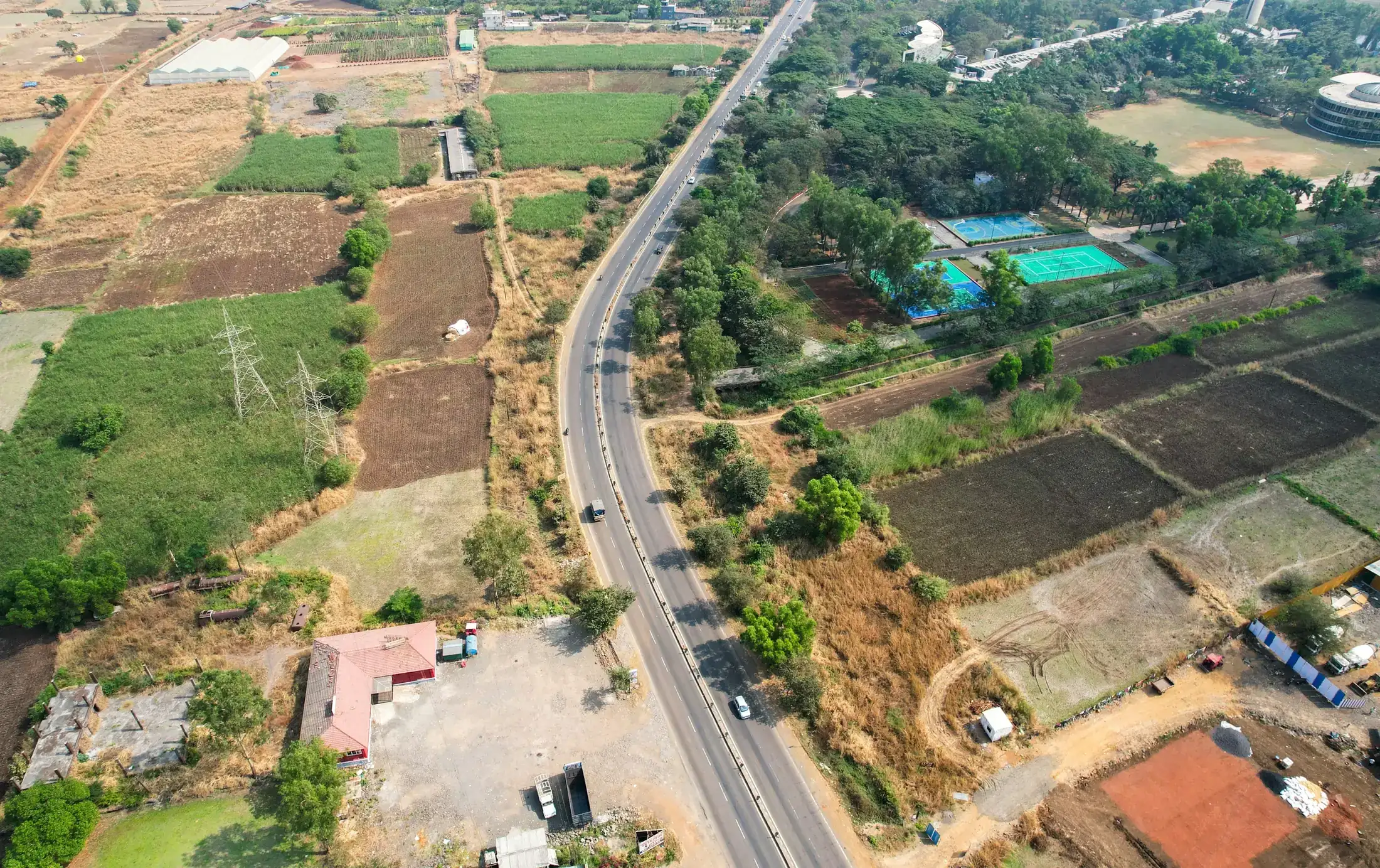 Aerial view of a highway through the Maharashtra countryside, used as a representative image