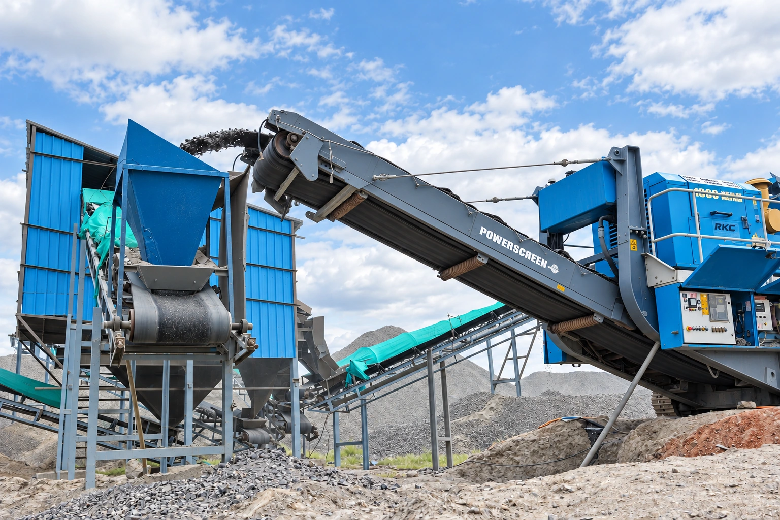 RKC Powerscreen crushing and screening machinery, conveyors and aggregate stockpiles