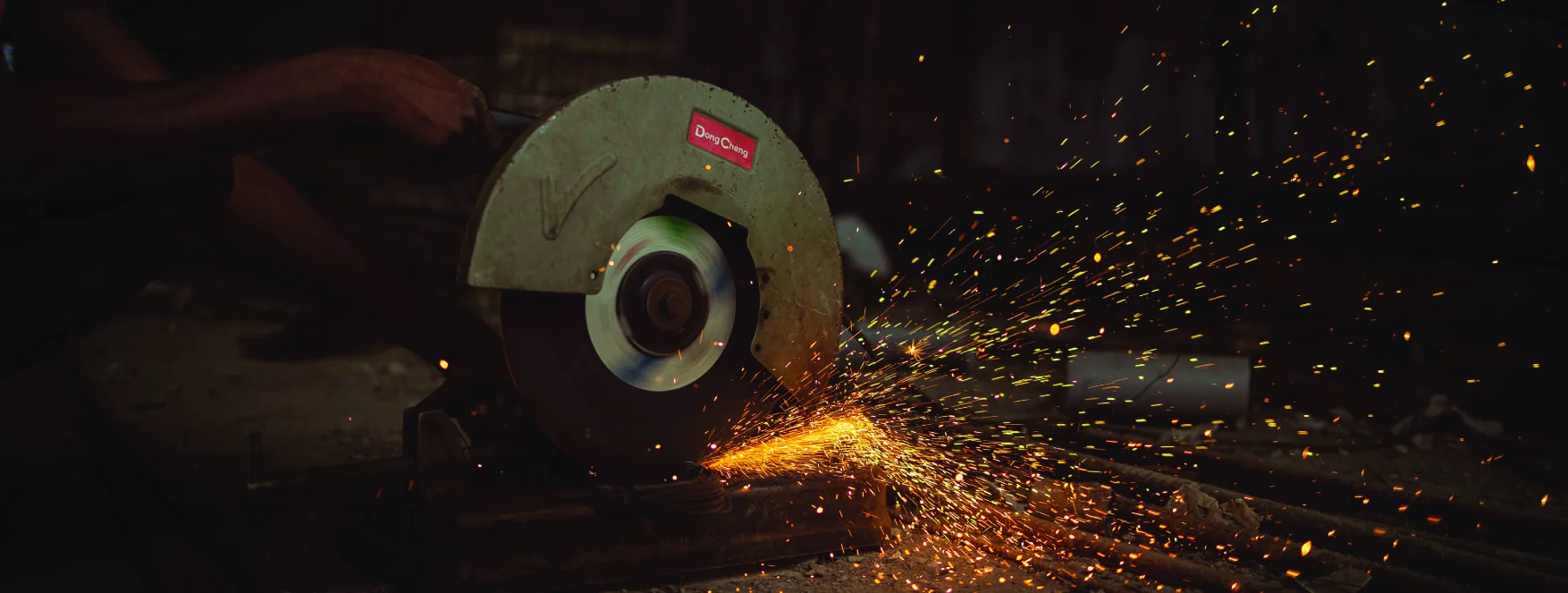 Sparks from a cutting disc in a workshop